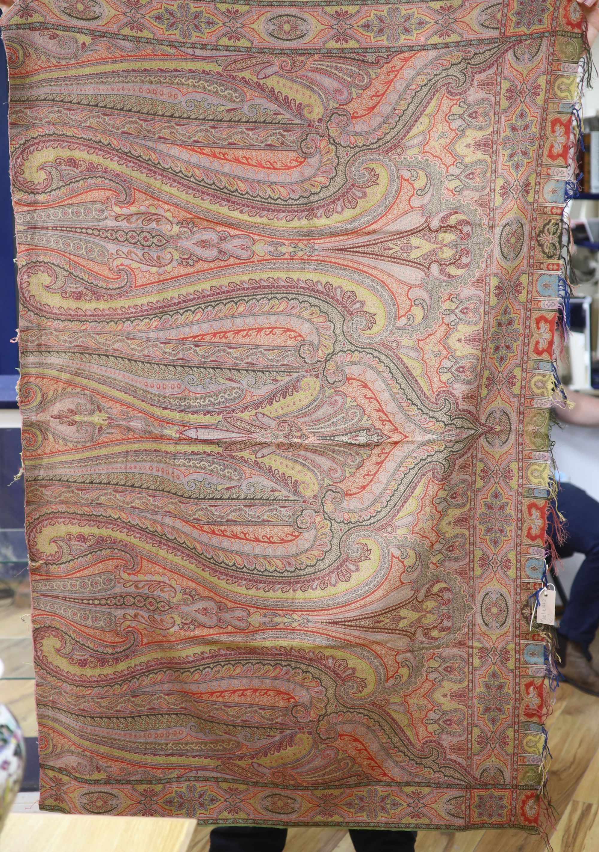 A 19th century Paisley shawl and two part Paisley shawls